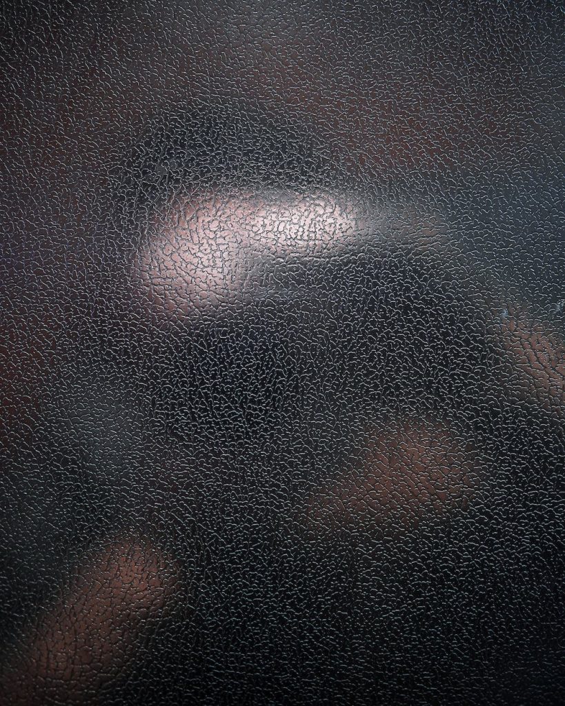 black and brown leather surface